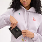 Coach Outlet Medium Corner Zip Wallet In Signature Canvas