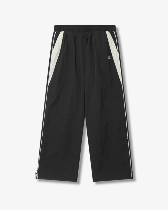 THE NYLON TRACK PANTS Hover Image