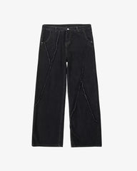 THE DISTRESSED BLACK JEANS