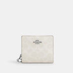 Coach Outlet Snap Wallet In Signature Canvas
